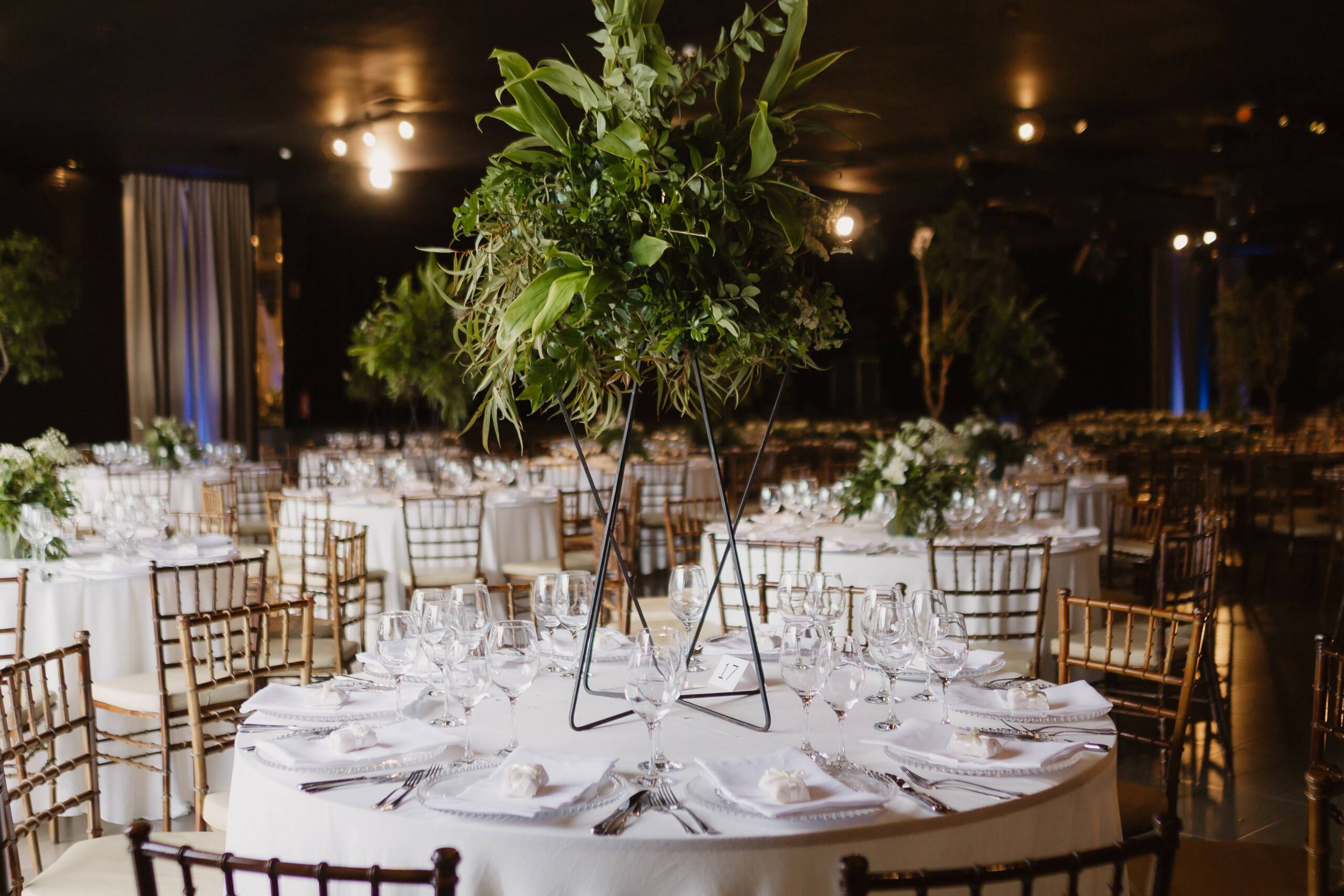 The interior of a restaurant decorated with flowers for a wedding celebration ceremony